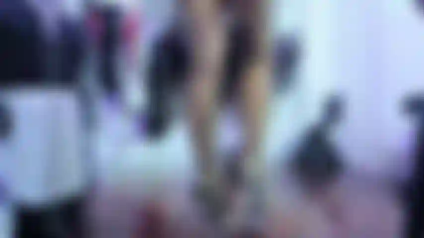 WALKING IN HIGH, CLEAR HEELS