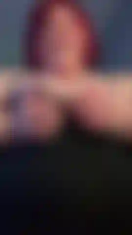 Titty massage tanktop red hair.