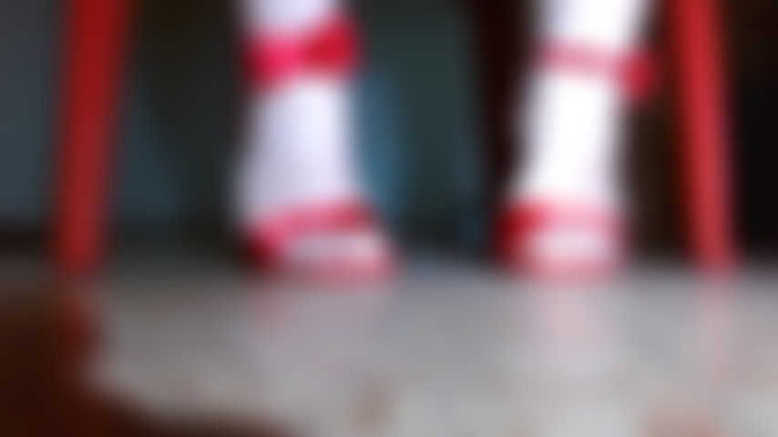 Red heels, lavan toe nails, smashing a little man.