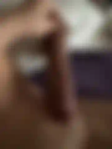 Mindy moaning on brown cock