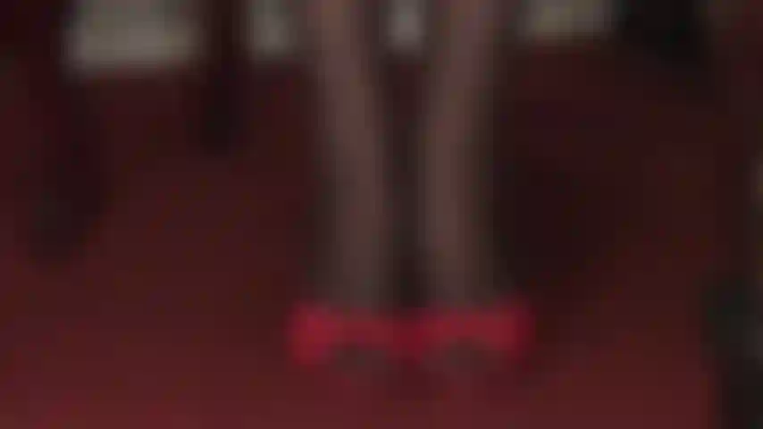 High heel and hosiery seduction - sexy red high heeled slides and floral pattern seamed black pantyhose are pure seduction.