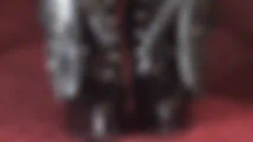 The power of her boots - At the mercy of Mistress' shiny black boots you crave to be stroked, kicked, trampled and whipped.