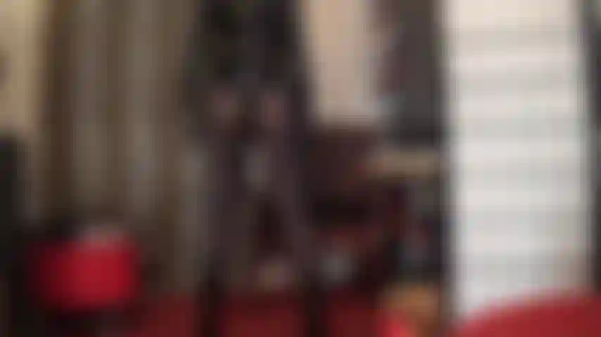 Thrusting her massive black strapon while mistress is teasing with her amazing pantyhose clad ass and tight shiny black pvc outfit.