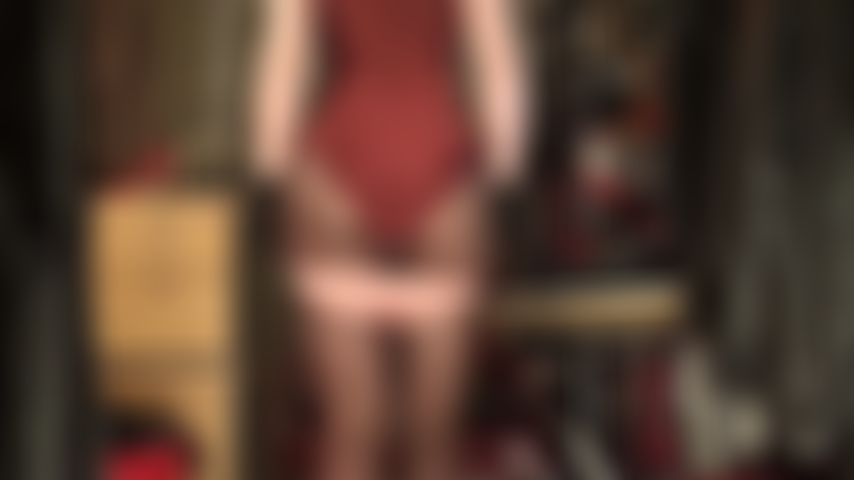 Teasing the shiny satin loving sub with a pair of silky pink panties and red satin skirt.