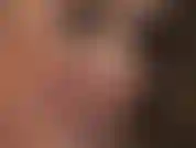 Admire mistress' beautiful face in closeup. Her sexy red lipstick lips teasing, her piercing blue eyes looking straight into your soul.