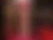 Here is a sexy short tease with mistress wearing a red dress, glossy brown pantyhose, and white leather jacket and heels, lifting her sexy dress to grant you permission to worship her ass.