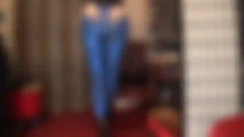 Body worship in blue metallic leggings and black ankle boots.