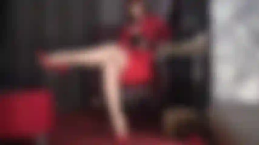 Nylon Lady in red milks your cock using the power of her incredible crossed legs in highest heels. (femdom, domination, leg worship, handjob, pantyhose, stilettos, high heels, leather gloves, gloves, satin blouse, dildo, redhead)