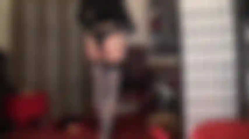 Shiny blue gray stockings on nude pantyhose with blue laced stiletto heel boots.