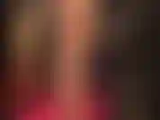 Vintage nude seamed ff nylon stockings and garters, sexy high heel pumps, a massive white strapon and long black leather coat.