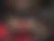 Red leather gloves on massive black strapon.