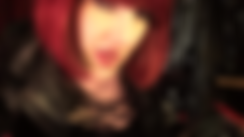 Spit is dripping from Mistress' hot red lips and wet tongue.