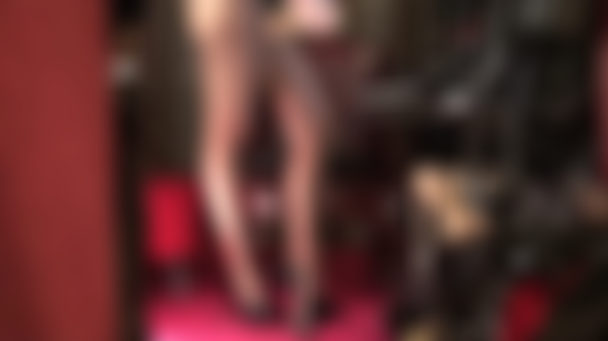 Heels and Cocks - Mistress jerks her strap-on while teasing another cock with her stilettos.