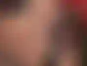 Wonderful dark red lips and tongue slowly teasing along a shiny metal stiletto while mistress' blue eyes are staring and hypnotizing you with a beautiful smile that melts your heart.