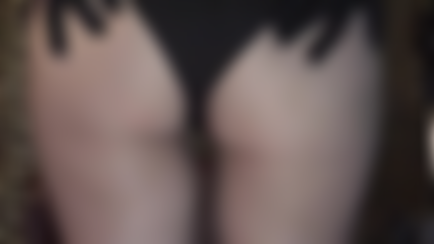 Extremely hot closeup of Mistress Vivian's sexy round butt in black super sheer pantyhose and tight shorts.