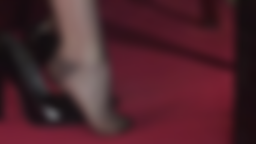 Foot worship and dangling shoes in vintage glossy nylons.