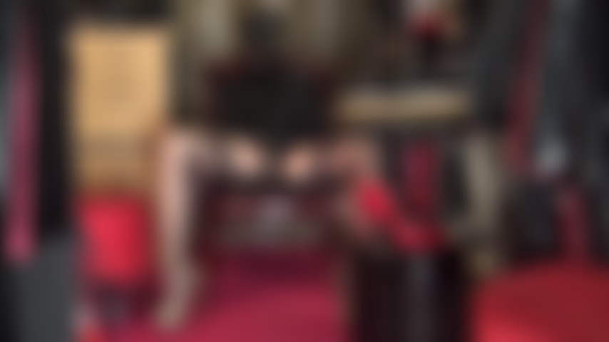 Hooded Mistress with Massive Strapon - Wearing hot stockings and garters, leather hat, spandex mask and leopard pumps, Mistress Vivian strokes her giant cock.
