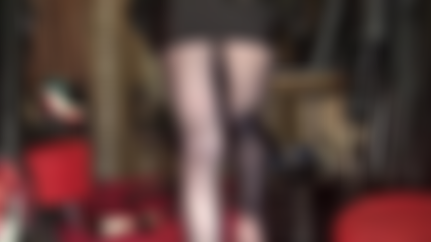 Navy blue sheer and glossy pantyhose foot soles right in your face.