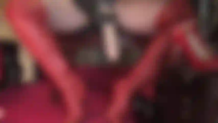 In beautiful red leather boots, glossy pantyhose, gloves and equipped with a huge strap-on - this is how mistress vivian awaits. Crawl under her desk and worship leather and cock.