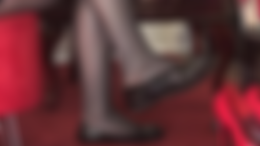 Dangling flats and peeptoe high heel pumps - Whether you like flat ballerinas or prefer a tall stiletto open toe pump, both shoes are pretty, black and shiny swinging from Mistress Vivian's toes.