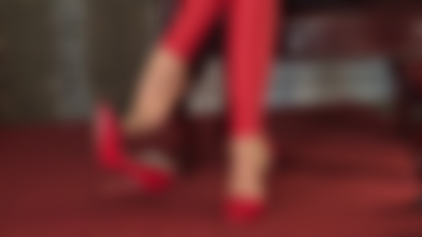 Red heels, dangling in tights and leggings