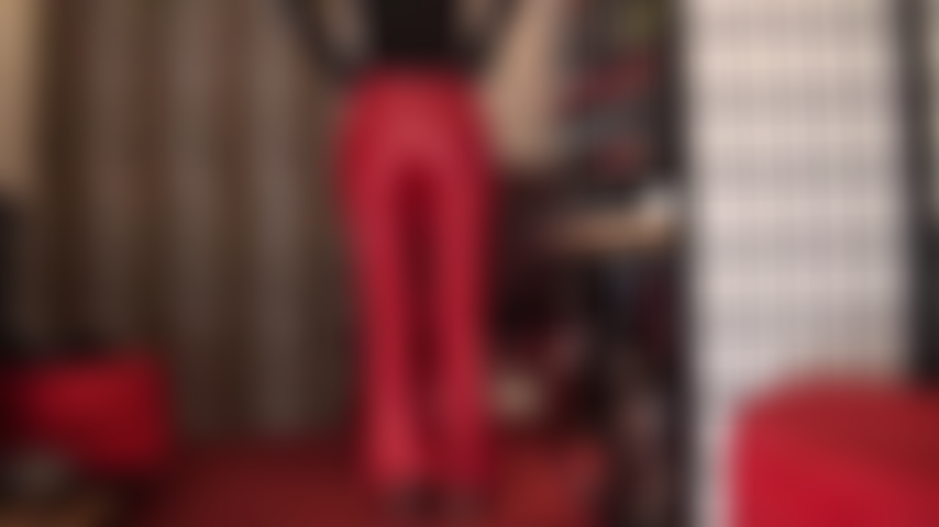Hot Red Leather Pants and Gloves - Your Goddess' butt in a tight pair of bright red leather pants and black gloves is an incredible vision.