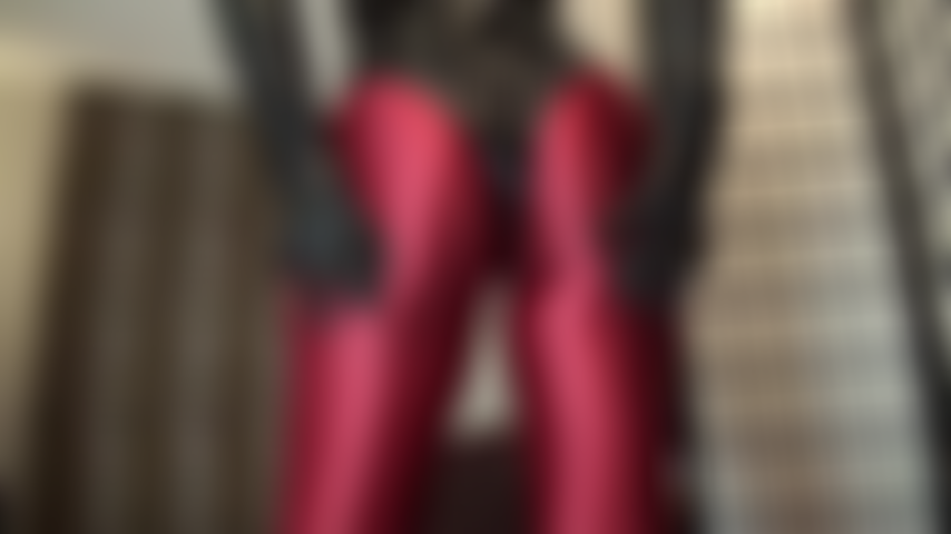 Shiny red spandex pantyhose and tight pvc thong bodysuit - Oh, to have that fabulous round ass lowered onto your face, even for just a sniff... Mistress touches and squeezes her perfect butt with leather gloves - so close to you.