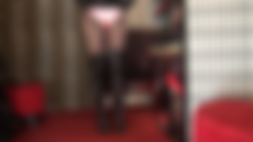 Satin panties and leather skirt - Mistress Vivian teases the panty lover with upskirt views onto a glossy pair of pink satin undies.
