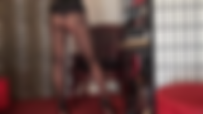 A silky red satin panty over black seamed pantyhose with upskirt tease has you dripping.
