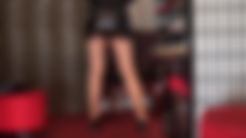 Dark tan hose and tight black pvc skirt tease - Mistress' ass and legs look divine in this color hosiery and shiny mini skirt.