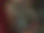 Semi transparent smoke colored latex catsuit worship.