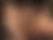 Worship mistress' beautiful curves in shiny tan pantyhose, caressed by long black leather gloves, mistress teases with the pantyhose gusset and sexy thong underneath.