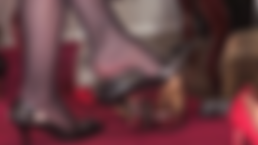 Silky pantyhose feet tease as they play with several pairs of pretty high heeled pumps.