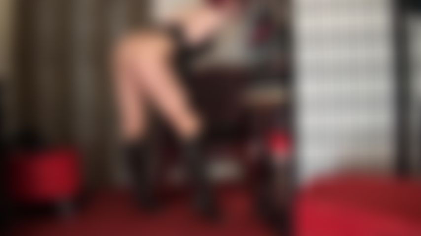 Teasing leg lovers and ass worshipers alike in this glossy tan pantyhose and black leather studded knee boots.