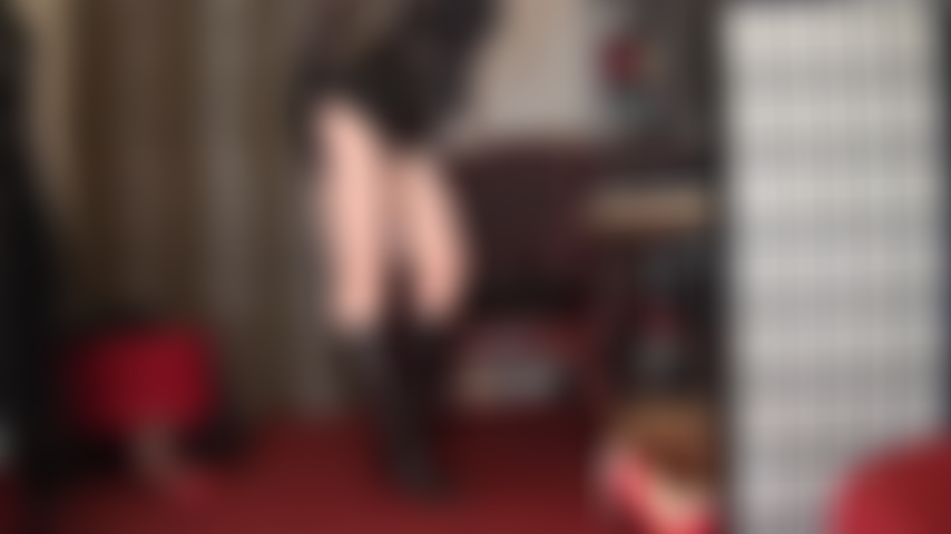 Giant strapon domination - Bare legs, leather knee boots and massive black cock.