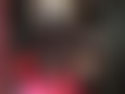 Sexy and sensual body worship in skin tight wetlook leggings, pantyhose and high heels with blouse and corset.