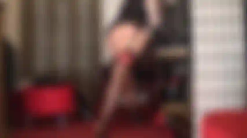 Mistress' incredible tease in red top stockings, garters, tall shiny boots and semi-sheer dress will have your slave cock dripping and begging for release.