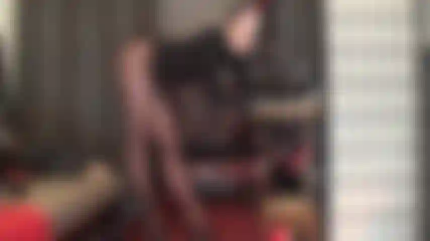 Teasing the pantyhose legs and foot lover in opaque brown tights and black leather high heeled mules.