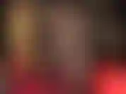 Legs in sheer black pantyhose. Mistress, dressed in leather corset, gloves, stilettos and tight skirt, teases the leg lover with sheer black hose.