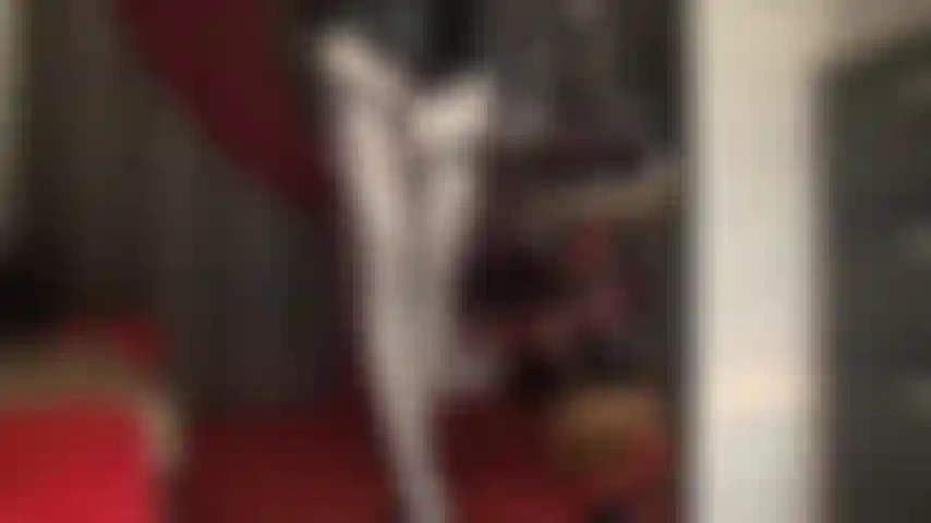 A very shiny combination of white leohex spandex tights and sheer black seamed stockings, giving the illusion of glossy metallic gray stockings. Worship this incredible shine.