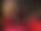 Glossy pantyhose layers, black, red and white, paired with shiny metallic stiletto peeptoes.