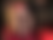 Mmmm mistress slides up her tight skirt to reveal vintage seamed stockings and garters underneath, then adding a shiny irresistible pair of silky red satin panties that go up and down, and up...