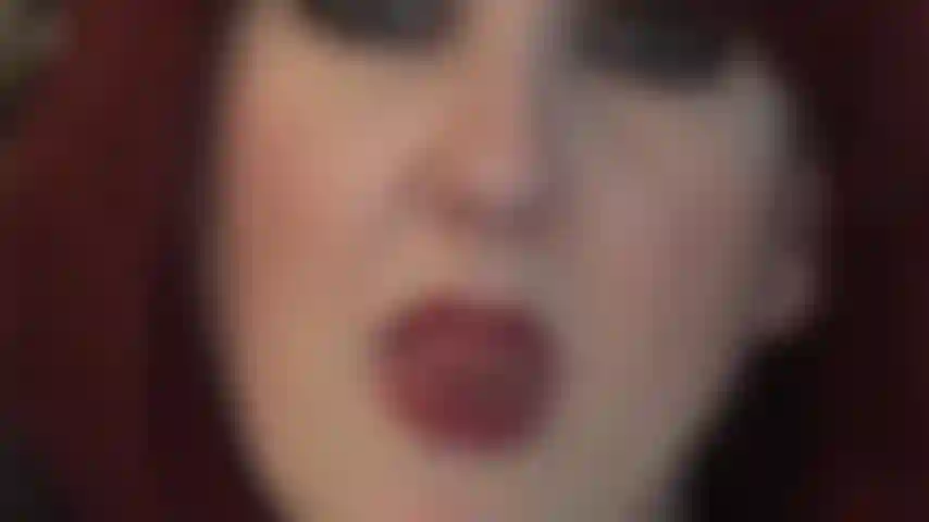 Irresistible lips, eyes and tongue - got lost in these eyes while being teased with mistress' wonderful red lips and moist tongue.