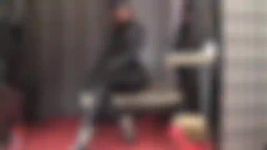 Worship this incredible black fetish outfit of shiny satin pants, corset and blouse, paired with leather boots, gloves, bolero jacket and hat, adding a long leather coat and floor length high gloss pvc coat.