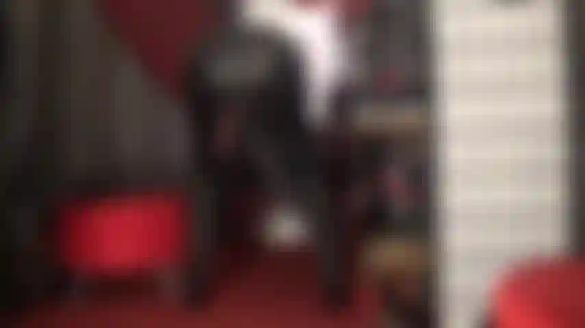 She taunts you with her massive black cock meat dangling from her leather skirt.