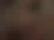 Extreme close up view of mistress' sexy nylon toes in gray shiny pantyhose.