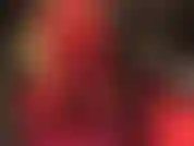 Tight red leather look leggings.