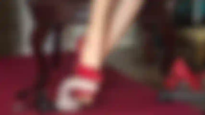 Tormenting your slave cock with sharp stiletto heels.