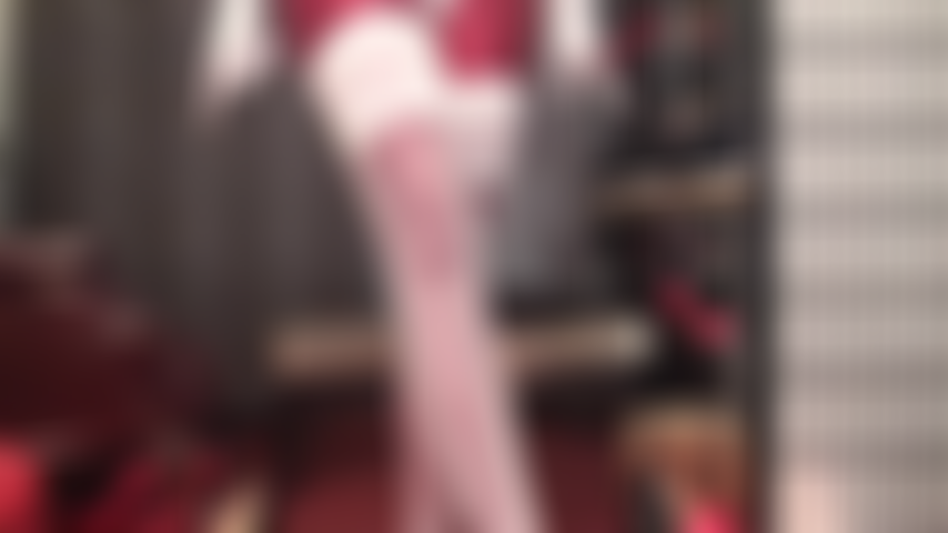 You'll become Mistress' little stroke puppet for these silky white lace top stockings on shiny red spandex tights, white satin gloves and red stilettos.