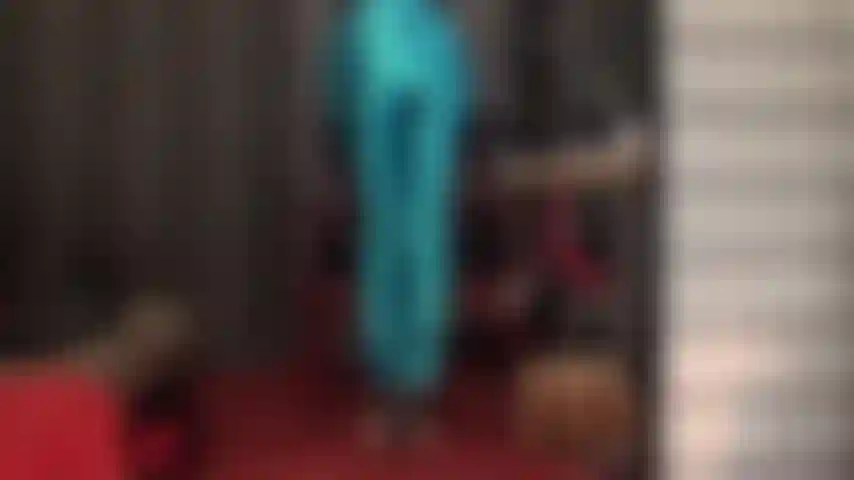 Shiny vibrant blue satin jeans - these high gloss pants really show off mistress' wonderful round ass.